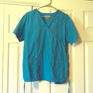 Lighter blue scrub top